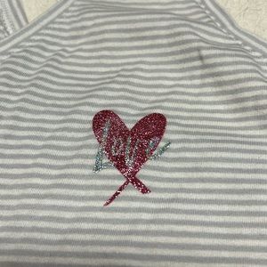 Two NWT Victoria’s Secret racerback tanks.